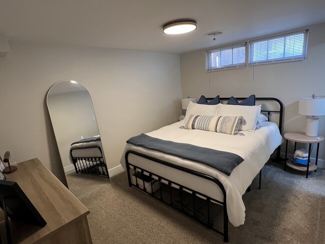 Bedroom with queen bed - 353 Lawton St Unit Downstairs