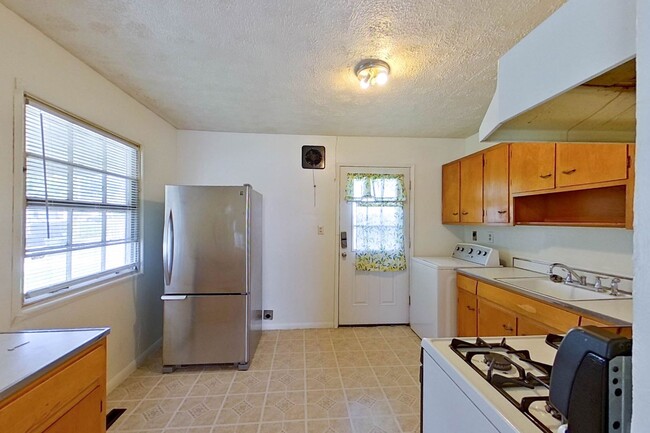 Photo - Charming 3-Bedroom, 1-Bath Single-Family Home near E 5th Ave