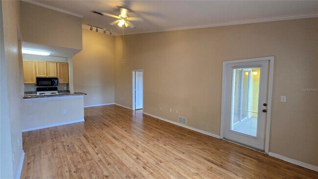 Photo - 10211 Courtney Palms Blvd Unit 304