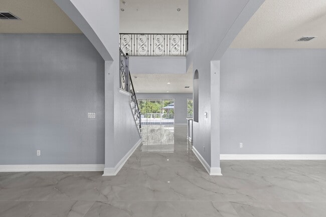 Spacious 6-Bedroom Home Near Lake Nona | 3-Car Garage + Tesla Charger