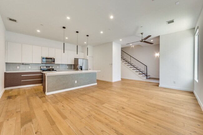 Photo - Live Above It All | Sleek Multi-Level Condo with Private Rooftop Deck
