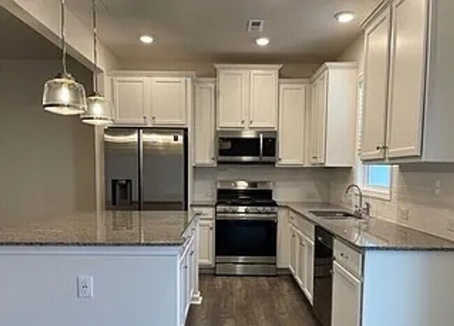 Photo - 3 BR/2BA | 1-Car Garage | End-Unit