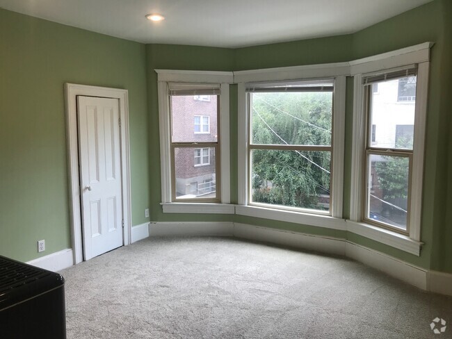 Building Photo - 1008 E Harrison St Unit 1008 1/2 Rental