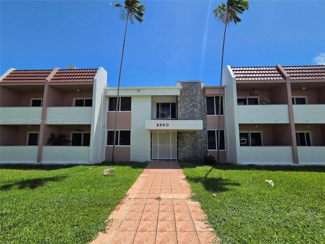 Building Photo - 8990 SW 24th St Unit 228