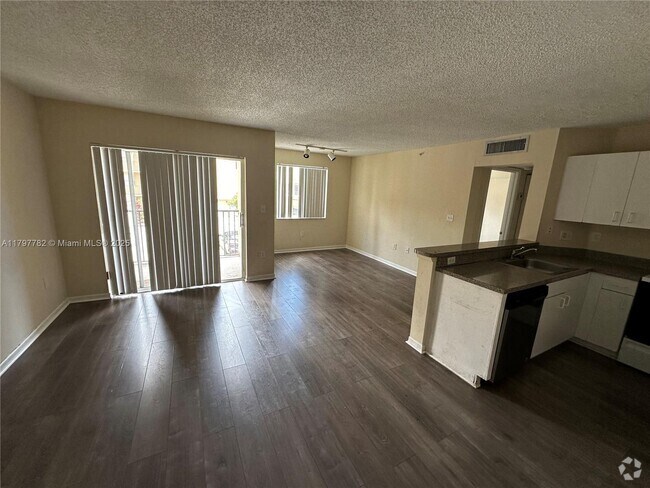 Building Photo - 791 N Pine Island Rd Unit 203 Rental