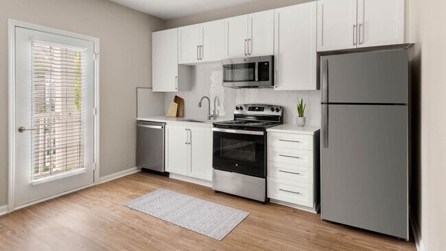 Cocina con electrodomésticos de acero inoxidable - Summit Crossing