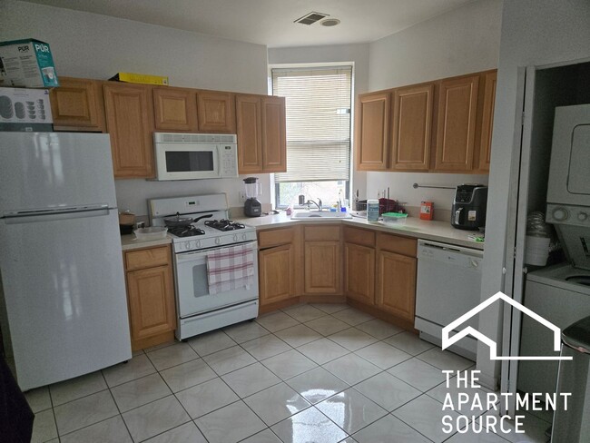 Building Photo - 1037 W Polk St Unit 3F