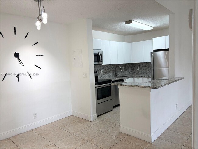 Building Photo - 10717 Cleary Blvd Unit 303