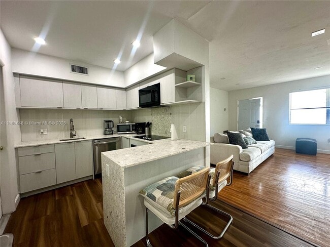 Building Photo - 1135 101st St Unit 5 Rental