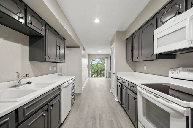 Building Photo - 5050 Ambassador Way Unit 302