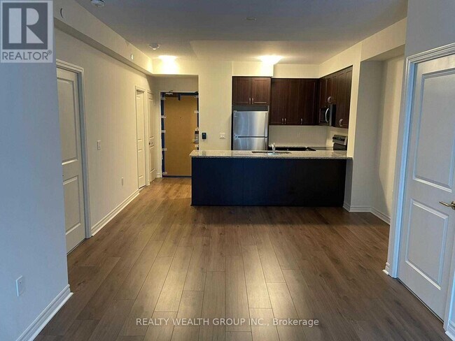 Photo - 349 Rathburn Rd W Unit 307