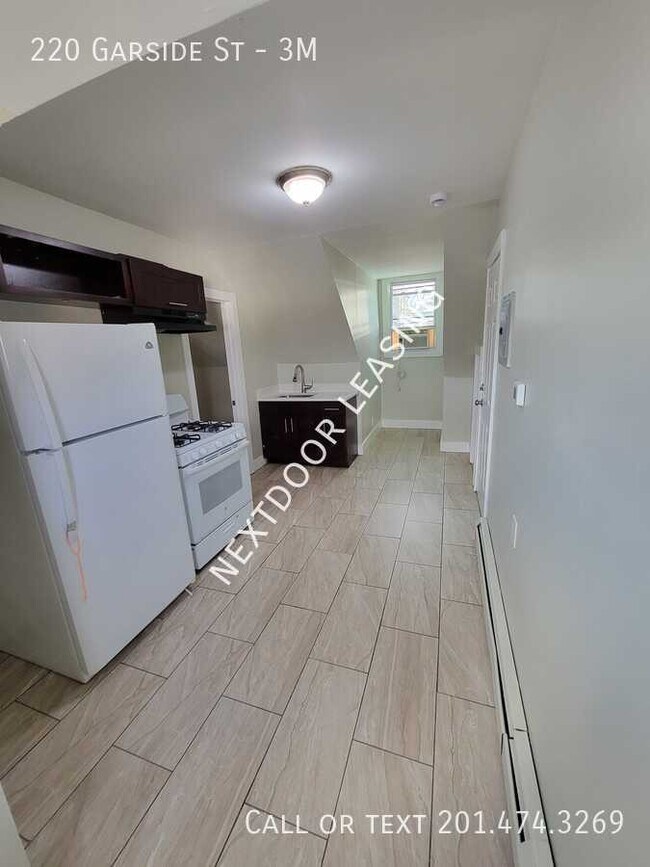 Building Photo - 220 Garside St Unit 3M