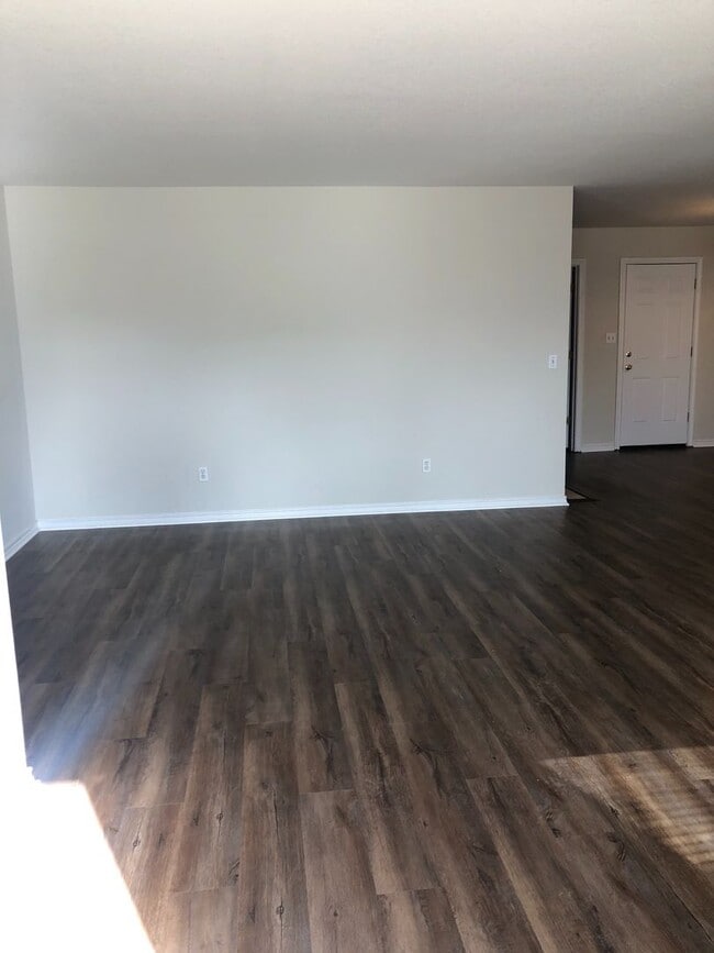 Photo - Full Brick 3 bed 2 bath 2 car Garage with fenced back yard! All new paint, Flooring, appliances!!