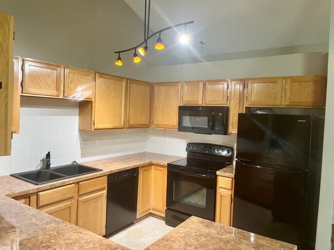 Photo - 2 Bed, 2 Bath Townhome with Office, & Fenced Back Patio in Prime Fort Collins Location!