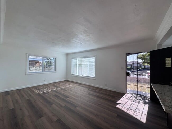 Photo - Charming 3-Bedroom Home with 2-Car Garage & Driveway Parking in North Long Beach