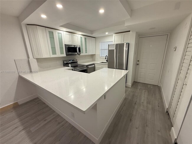 Building Photo - 11477 NW 39th Ct Unit 104-1