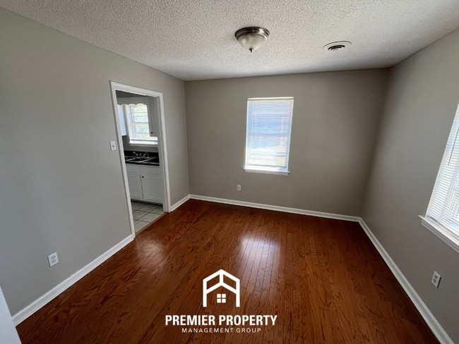 Photo - Charming 3BR Home in 38118 | Hardwood Floors & Spacious Fenced Backyard