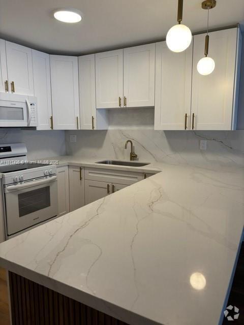 Building Photo - 6070 W 19th Ave Unit 115 Rental