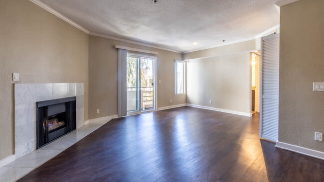 Living Room with Fireplace and Hard Surfacing Flooring - Vantage Hollywood
