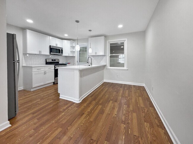 Photo - Spacious 3BR Home with Finished Basement & Flex Space