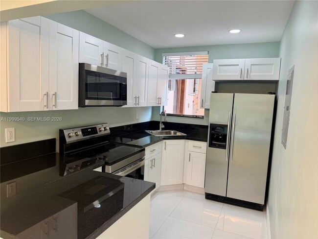 Building Photo - 5888 W 25th Ct