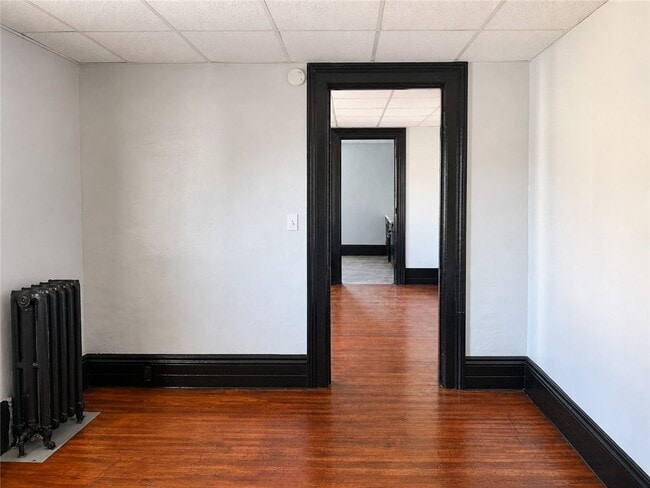 Photo - 111-115-115 Lyell Ave