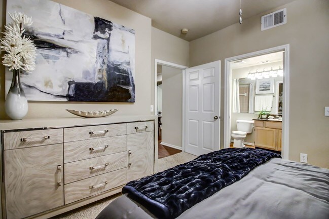 Spacious bedrooms with large windows for natural lighting, ceiling fan and plush carpet