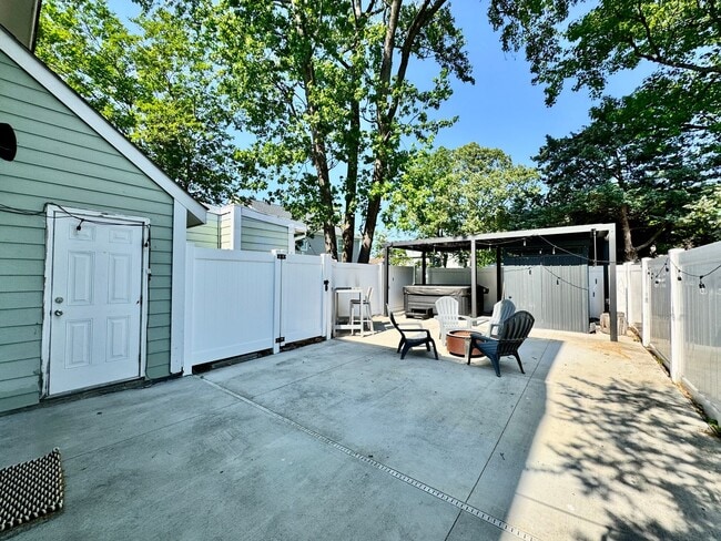 Photo - Ready NOW! A Custom Townhouse-Style Duplex Blocks to the Beaches! Fenced Yard - Hot Tub - Pet Fri...