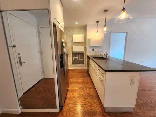 Photo - 2BR 2BA w/ Curvy Balcony, In-Unit Laundry, Gym, Roof Deck In Boutique Low-Rise Doorman Building Unit 401