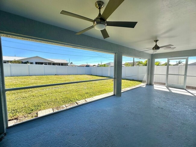 Photo - Stunning 3 Bedroom + Den Home with Fence + Screened Lanai in Great Location!