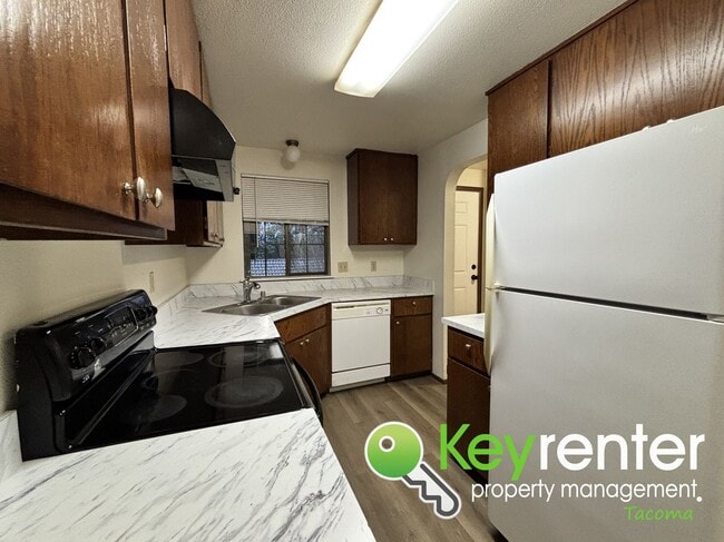 Photo - Comfortable Upstairs 2 Bedroom 2 Bath Rental in Private Community Near Fircrest!