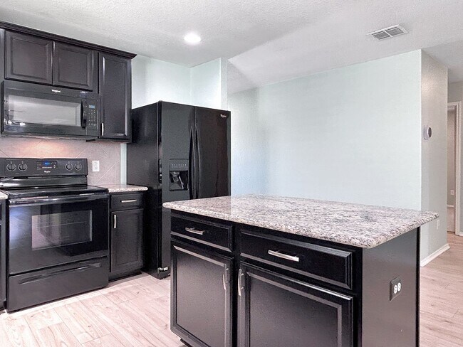 Photo - Far West Side 3BR Home with Study, Island Kitchen & Covered Patio