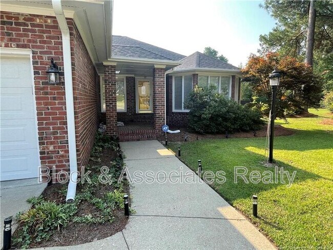 Building Photo - 6560 Windy Creek Way