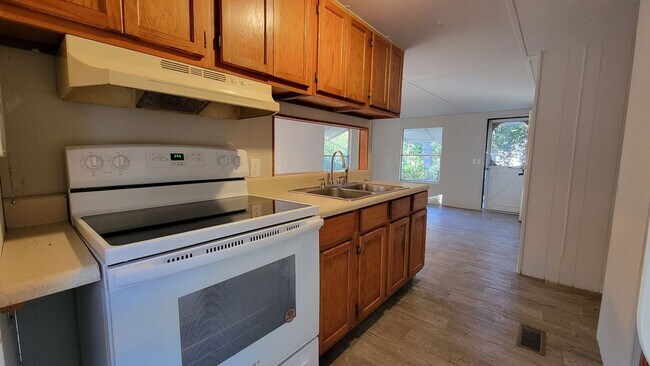 Photo - FULLY FENCED! 3 bedroom, 1 bath home plus a covered deck