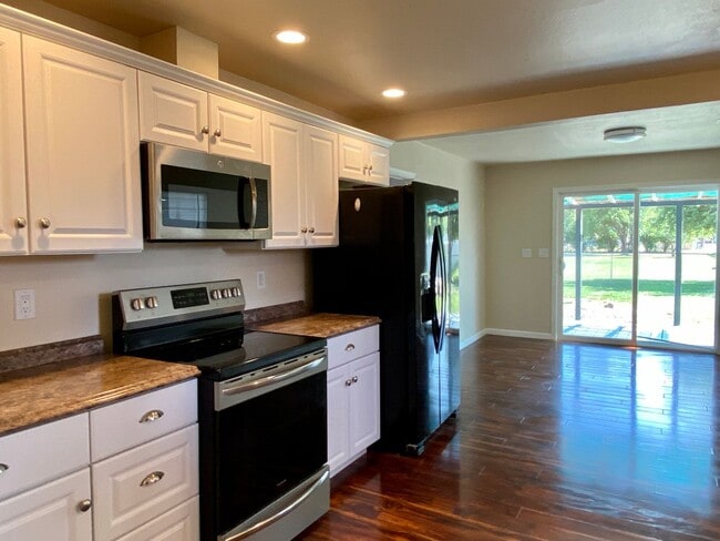 Photo - Charming 2bdrm, 1.bath house with garage, workshop space and large yard