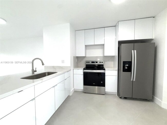 Building Photo - 15969 NW 64th Ave Unit 313