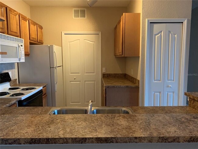 Photo - 5572 Metrowest Blvd Unit 5-209
