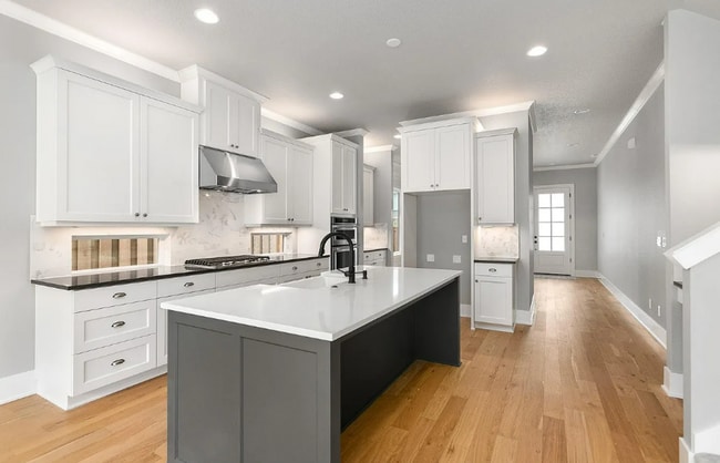 Photo - Stunning Bethany Farmhouse with Chef’s Kitchen, Media Room, Main-Level Suite & Luxury Designer Fi...