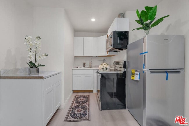 Photo - 7705 Baird Ave