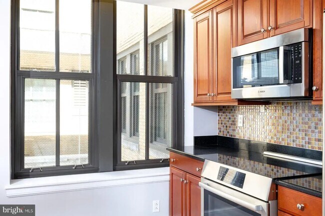Photo - Spacious 4-Bedroom Residence with In-Unit Laundry in Center City
