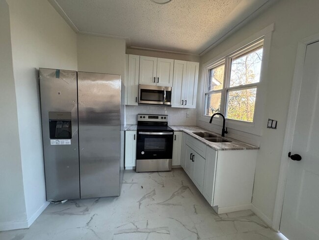 Photo - 3 Bedroom. Fully remodeled,  Close to I-77... Unit East Broad Street 236