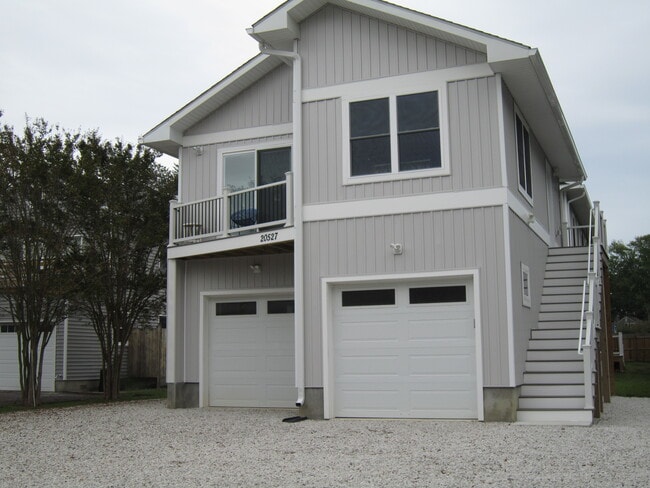 Exterior Street View w/ Stairway - 20527 Washington St Unit Garrage Carriage House