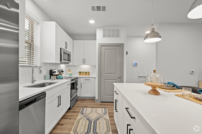 1BR, 1.5BA - 1,076SF Green Teal