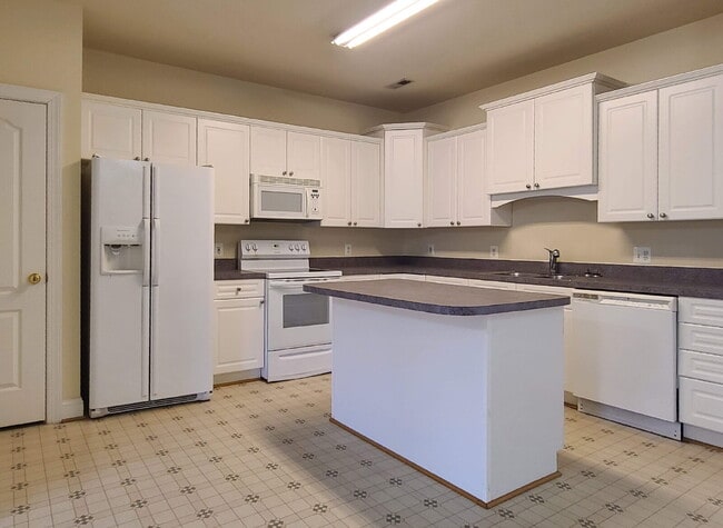 Photo - 3-Level Townhome with Two Primary Suites