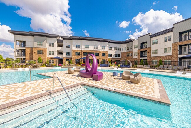 Soak up the sunshine by the sparkling pool.