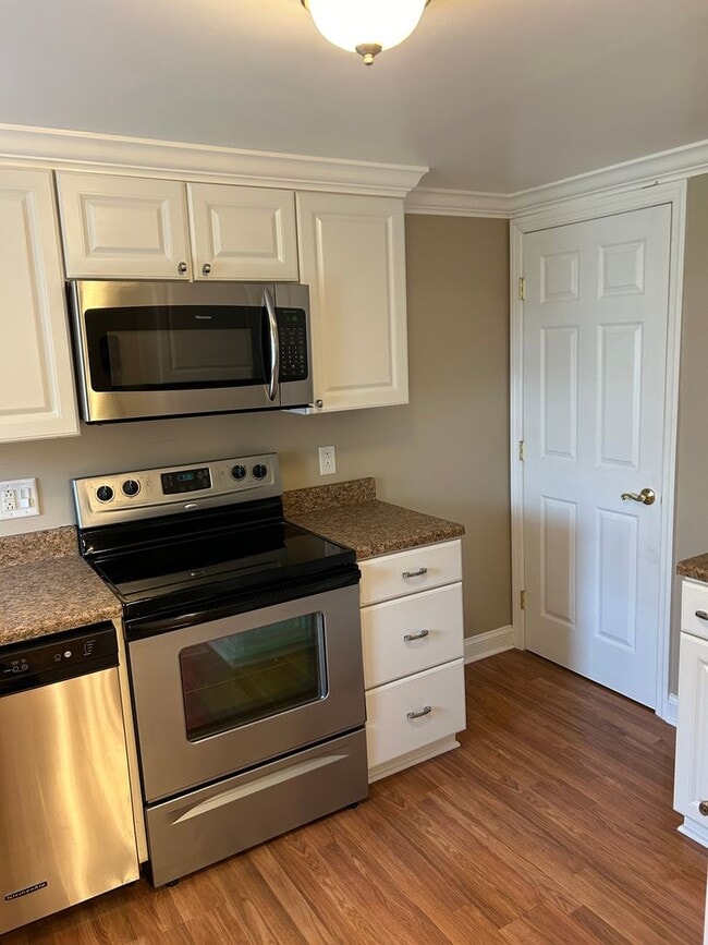 Photo - Modern Charm: 2 BR Home with Finished Basement, Pet Friendly, Assigned Parking, and Prime Location!