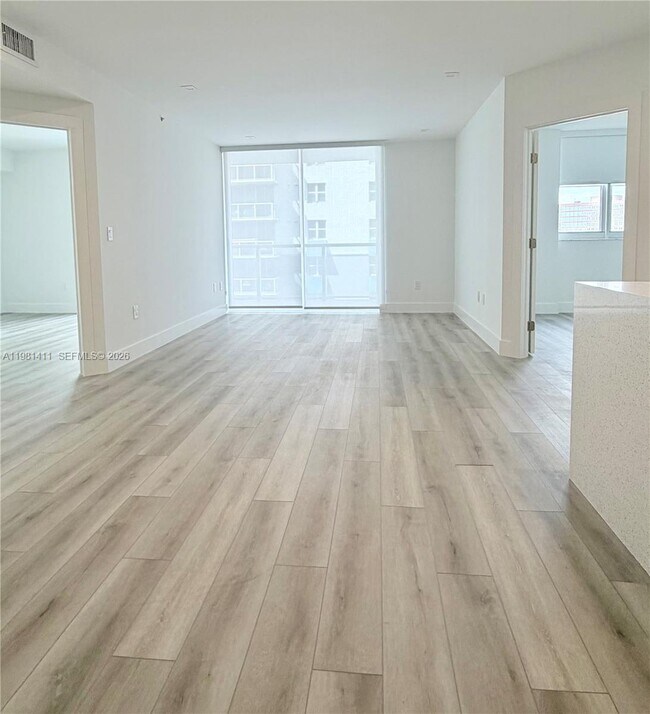 Building Photo - 5077 NW 7th St Unit 706