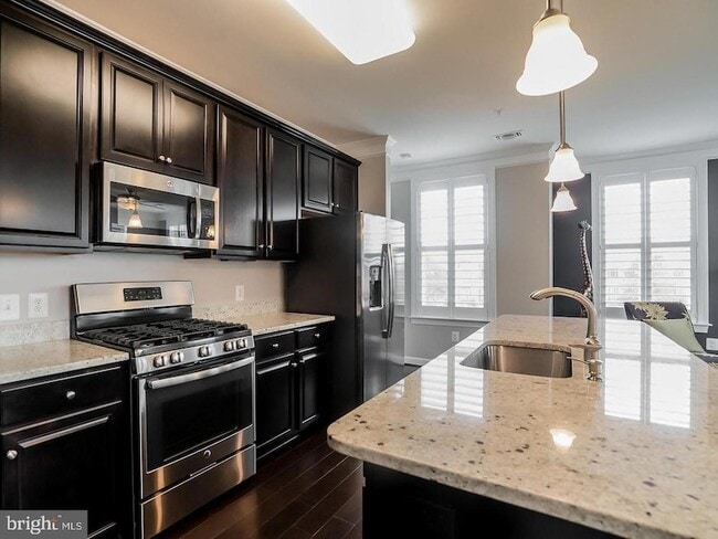 Photo - 13722 Neil Armstrong Ave Unit 308