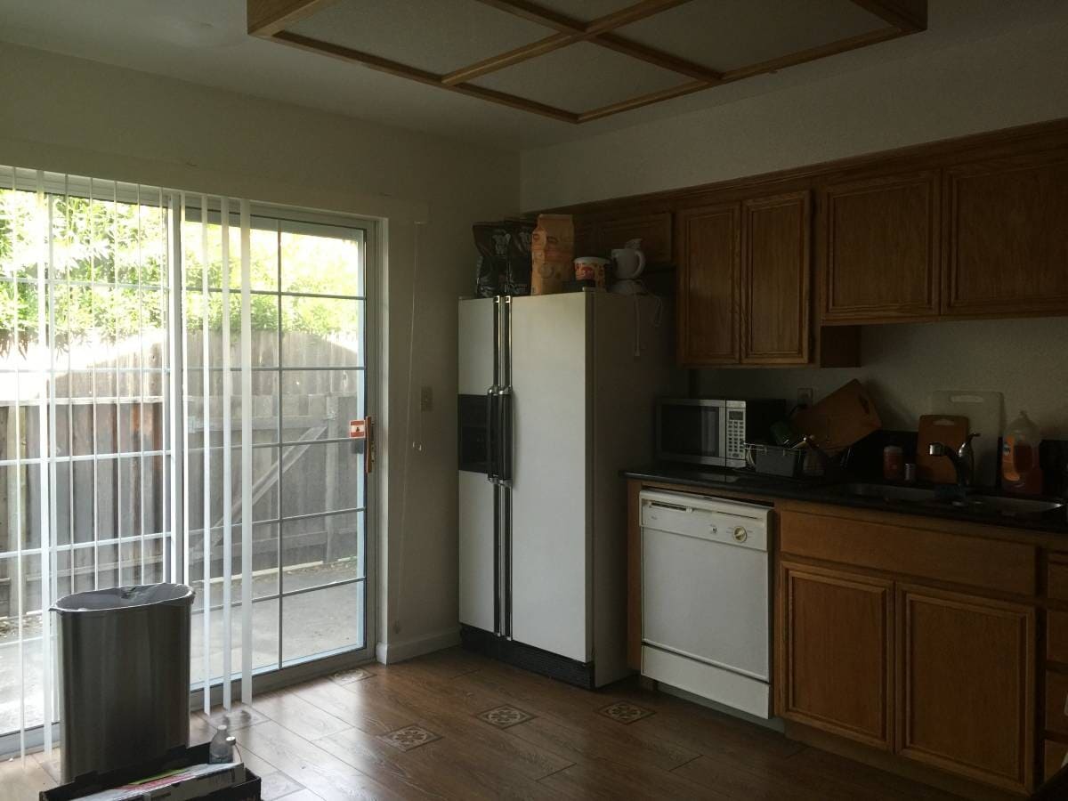 Kitchen is bright and opens to a patio. - 135 Margo Drive