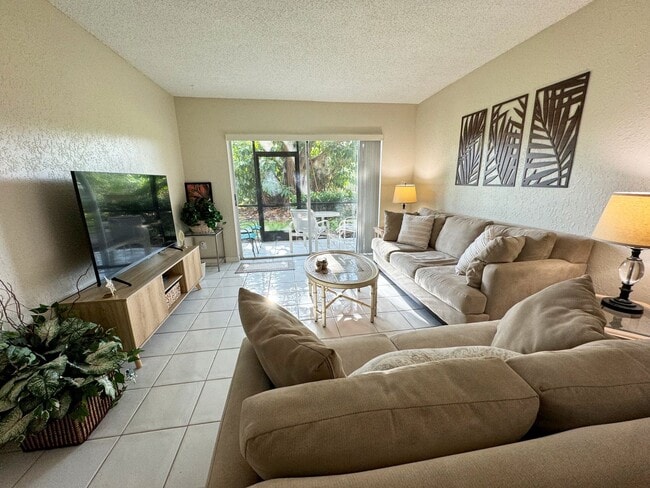 Building Photo - 5-Min Walk to FAU – Private Room in Furnished 2/2 Condo w/ Pool & Canal Views – $1,700